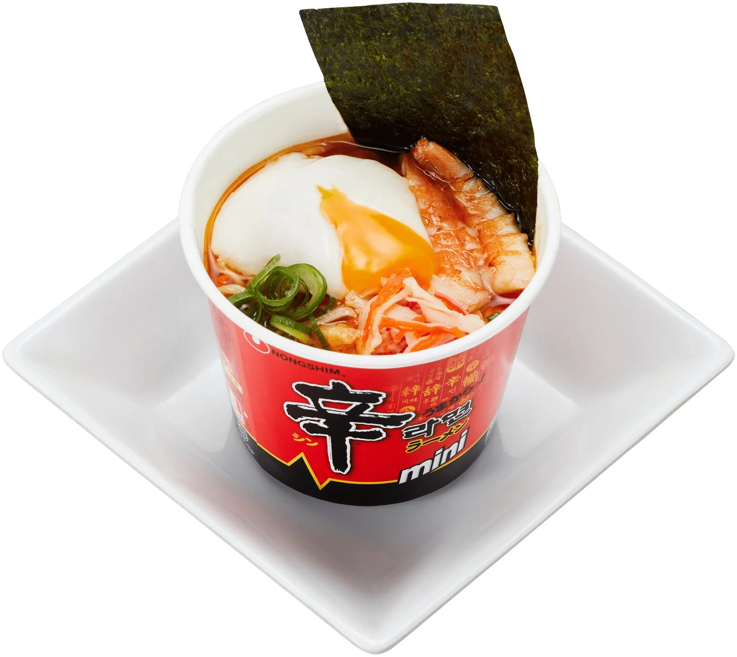 半熟卵、エビ、カニカマ、ねぎ、海苔がトッピングされた辛ラーメンミニ